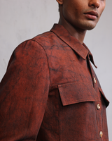 Rust coated denim jacket